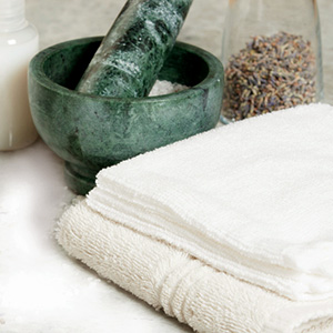 Spa Room. Aroma Salt. Mortar. Dried Lavender Flowers. Toiletries